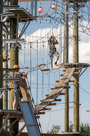 Students gather by the upper fields on the BYU-Idaho Campus to play recreation games, slip 'n' slide, mud volleyball, and try the ropes course.
