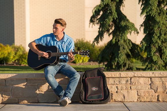 Enjoying the peace and quiet playing some tunes to pass the time.