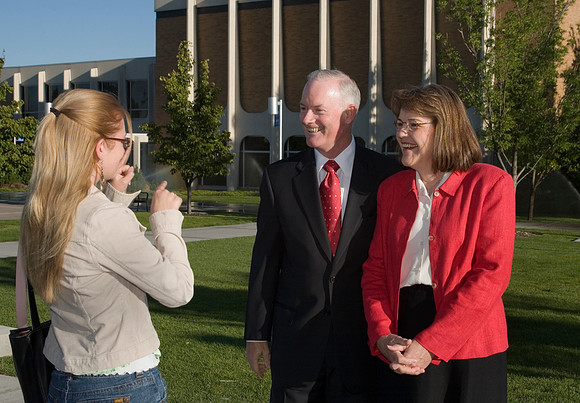 President and Sister Clark on campus with students.