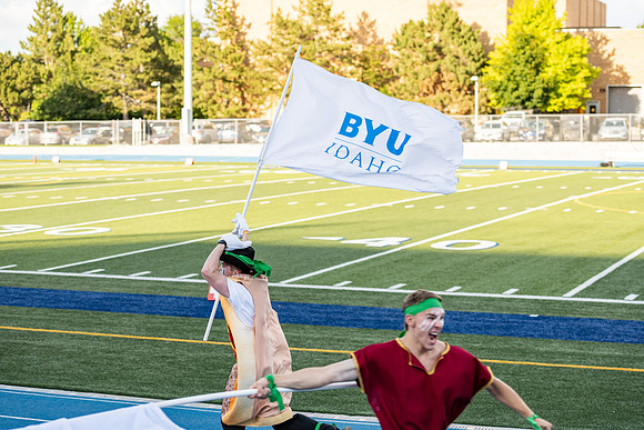 Students gather at the stadium to watch the football championship.