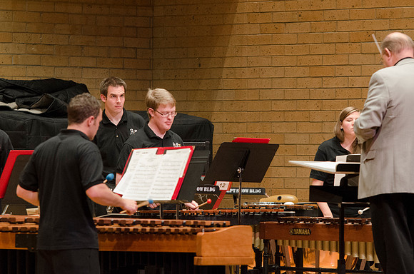 Conductor leading piece, Students playing percussions at the RixStix concert, Spring 2013