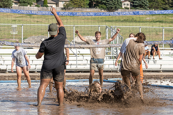 Students gather by the upper fields on the BYU-Idaho Campus to play recreation games, slip 'n' slide, mud volleyball, and try the ropes course.