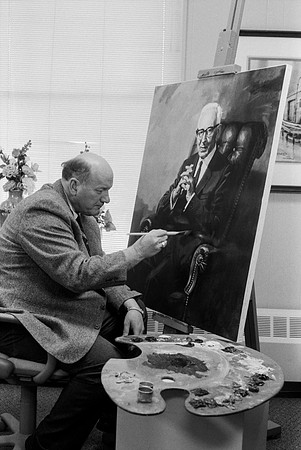 Dick Bird restoring painting of President Joseph Fielding Smith.