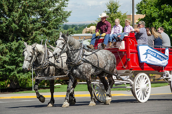 Students and others taking a wagon ride around campus at BYU-Idaho's first Ag Days