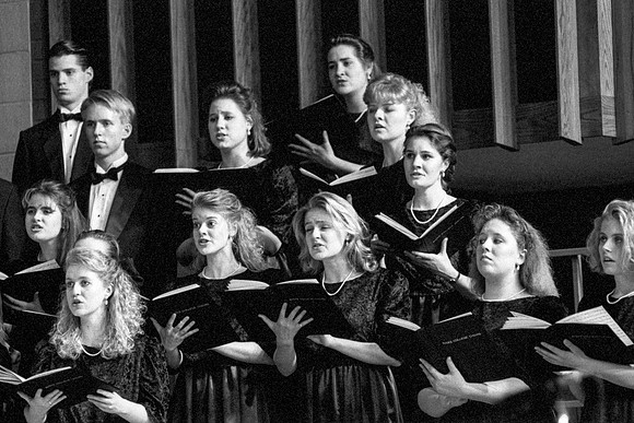Members of the Choir singing a piece
