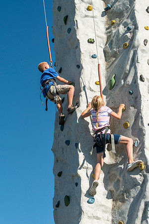 Faculty and their families, as part of the Online Learning & Teaching Conference, join together for dinner and games.