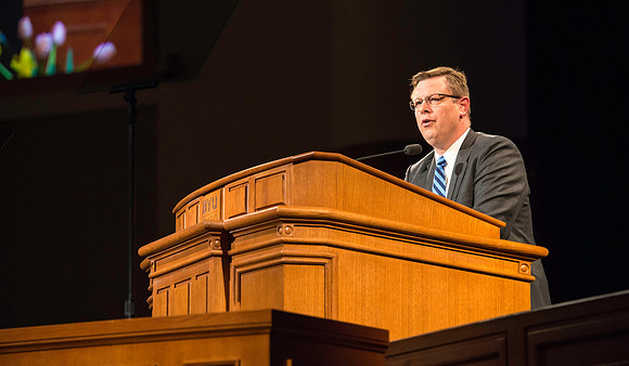 President Gilbert addresses the students the first devotional of the semester.