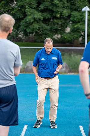 Faculty and community members of BYUI at Speed and Agility triathlete trannings at the stadium.