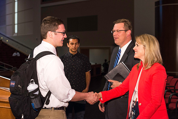 President and Sister Gilbert greet students after the first devotional of the semester.
