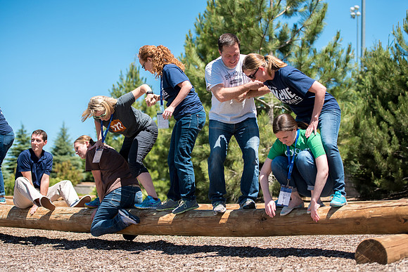Online Instructors come to BYU-Idaho campus for further learning to enhance teaching skills. Instructors take their turn at the Ropes Course.