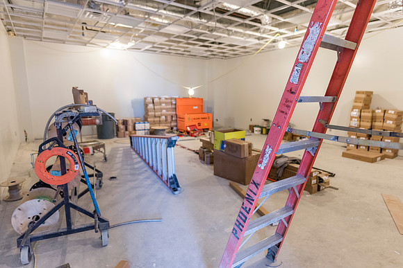 Faculty Members tour the new science building while it is still under construction.