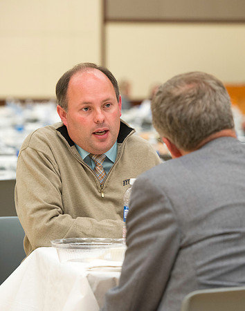 Faculty mingle after Dr. Maryellen Weimer addresses the faculty during a luncheon.