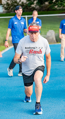 Faculty and community members of BYUI at Speed and Agility triathlete trannings at the stadium.