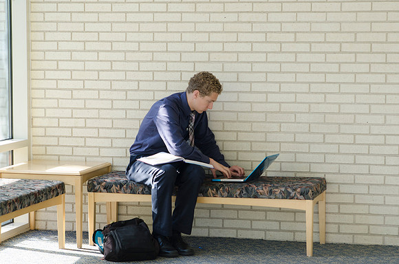 Student studying in the John Taylor Building