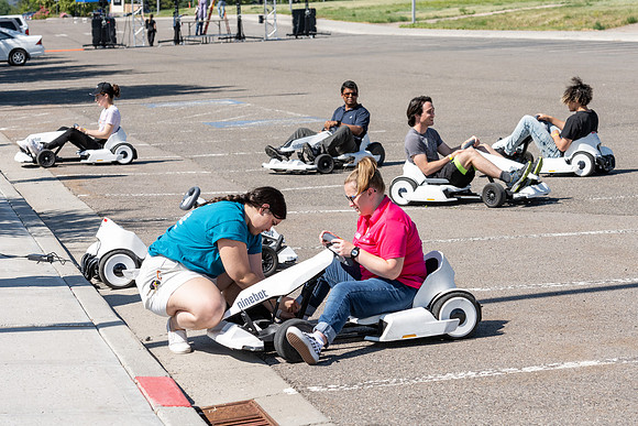 Students gather by the upper fields on the BYU-Idaho Campus to play recreation games, slip 'n' slide, mud volleyball, and try the ropes course.