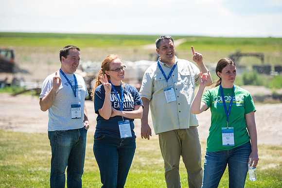 Online Instructors come to BYU-Idaho campus for further learning to enhance teaching skills. Instructors take their turn at the Ropes Course.