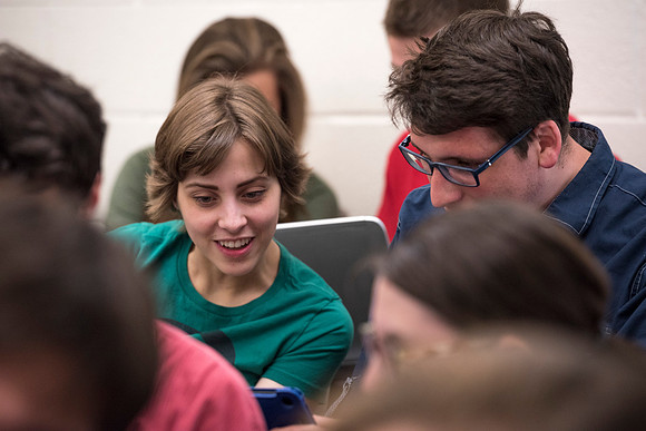 Students working with each other in the Foundations of the Restoration course on campus.