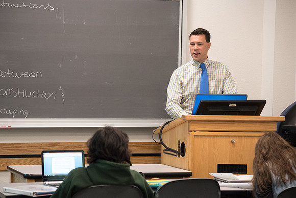 Scott Martin, Visiting Faculty in the Psychology department, teaches students in the psychology department.
