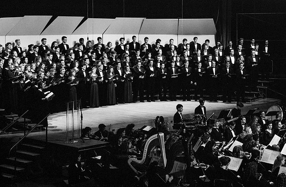 Sacred Music Series: Visions of Eternity. Choir members sing a piece for the performance. Performance held in the Hart Auditorium of Ricks College.