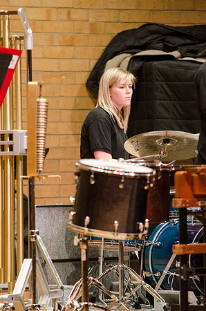 Student playing drums at the RixStix concert, Spring 2013