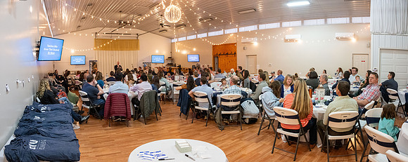 Alumni in the Cache Valley area gather at Eagles Landing Event Center, in Smithfield, Utah and get the chance to listen to and meet President Meredith.