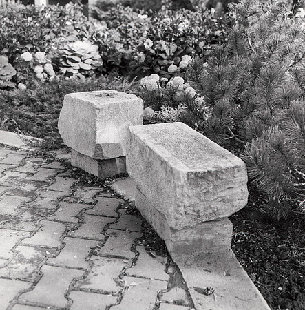 Two stones from the original Nauvoo, Illinois Temple. Pioneers brought the stones over across the plains and rested behind the Jacob Spori Building.