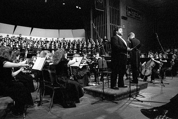The Choir and Orchestra performing a piece