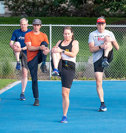 Faculty and community members of BYUI at Speed and Agility triathlete trannings at the stadium.