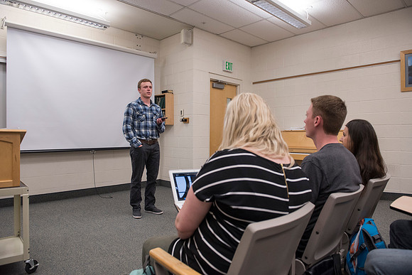 A student teaching other students in the Foundations of the Restoration course on campus.