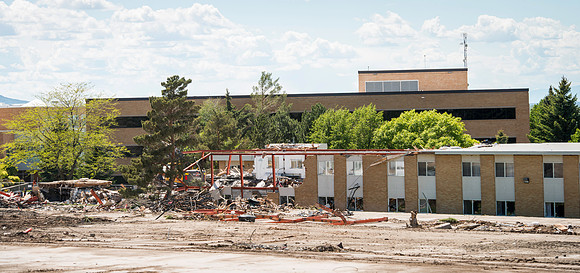 History coming down to make room for more parking.