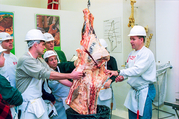 Students participate in a Meat Cutting Lab. February 2000.