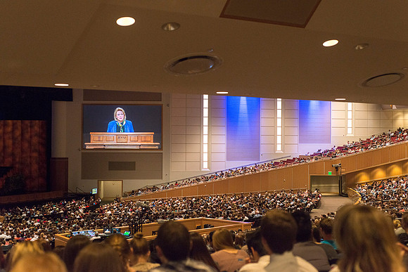 Sheri Dew speaks at devotional and gives out lots of hugs and greetings afterwards.