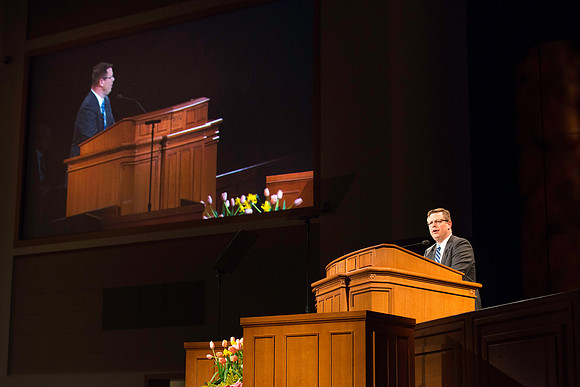 President Gilbert addresses the students the first devotional of the semester.