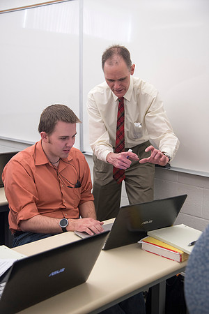 Mechanical Engineering instructor, Russell Daines, teaches the Fluid Mechanics course in the Austin building.