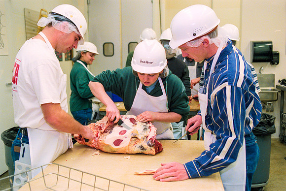 Students participate in a Meat Cutting Lab. February 2000.