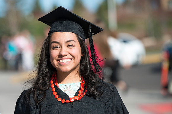 Students gather in their cap and gowns for graduation from BYU-Idaho April 6, 2016.