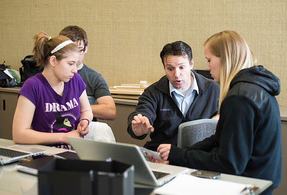Graphic Design Class taught by Shawn Randall. Students work in teams designing museum space for the Geotourism Museum in Driggs, Idaho. The winning group will help implement their design.