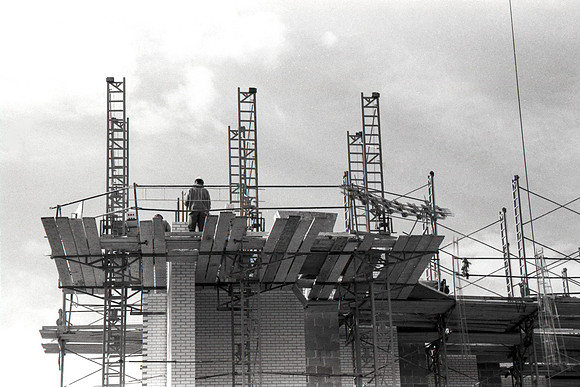 Construction takes place on the Religion Building site.