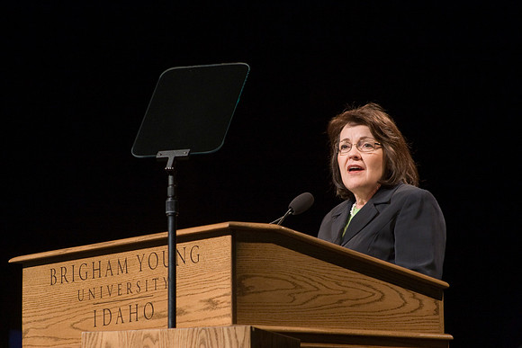 Sister Sue Clark speaking at a devotional.
