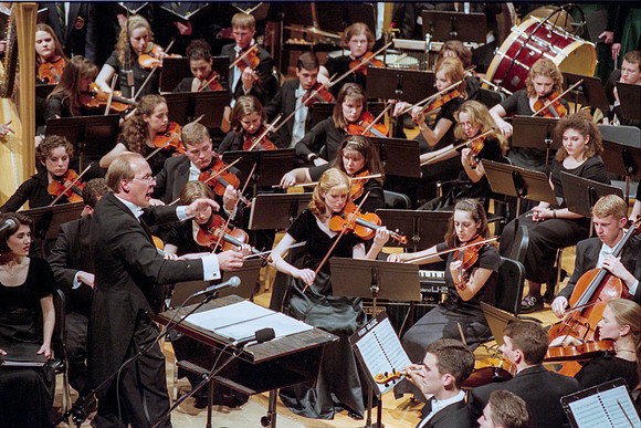 1999 Sacred Music Performance in the Snow Barrus Concert Hall. Commissioned composition by Merrill Jenson. Featuring Ricks College Symphony Orchestra, Collegiate Singers, and Concert Chorale with LDS