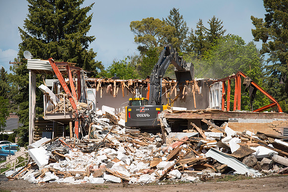 History coming down to make room for more parking.