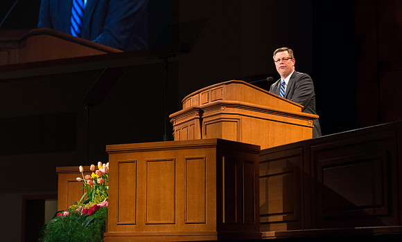 President Gilbert addresses the students the first devotional of the semester.