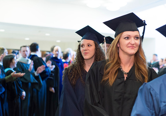Graduates march the Processional into the I-Center.