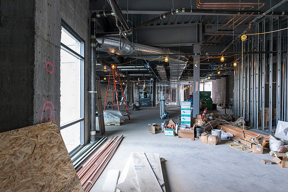 Faculty Members tour the new science building while it is still under construction.