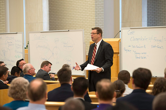 President Gilbert meets with employees in the Taylor Chapel.