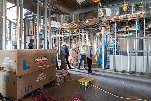 Faculty Members tour the new science building while it is still under construction.