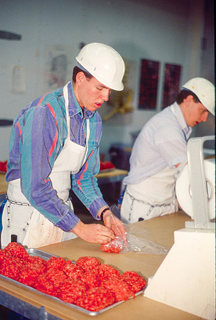 Students participate in a Meat Cutting Lab. February 1995.