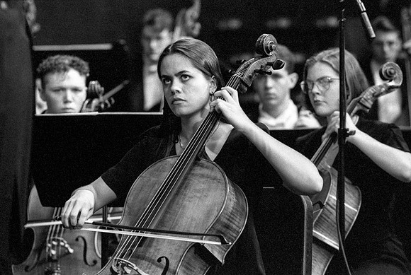 Members of the Orchestra performing a piece