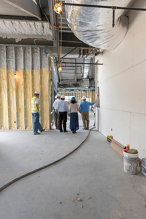 Faculty Members tour the new science building while it is still under construction.
