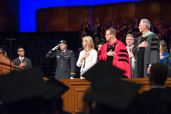 Second Leutenant, Tyler Rickenbach calls the colors at the start of Commencement.